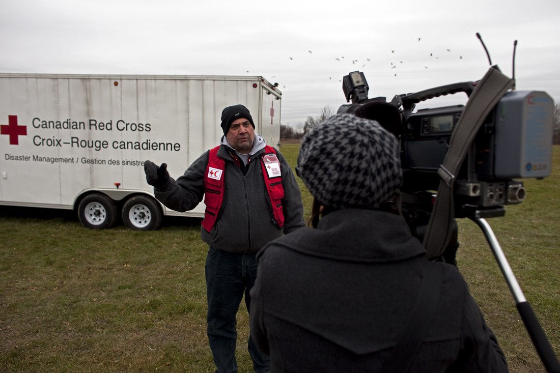 Provincial Disaster Management Director, John Saunders, is interviewed by Rogers TV. / Photo credit: Johan Hallberg-Campbell