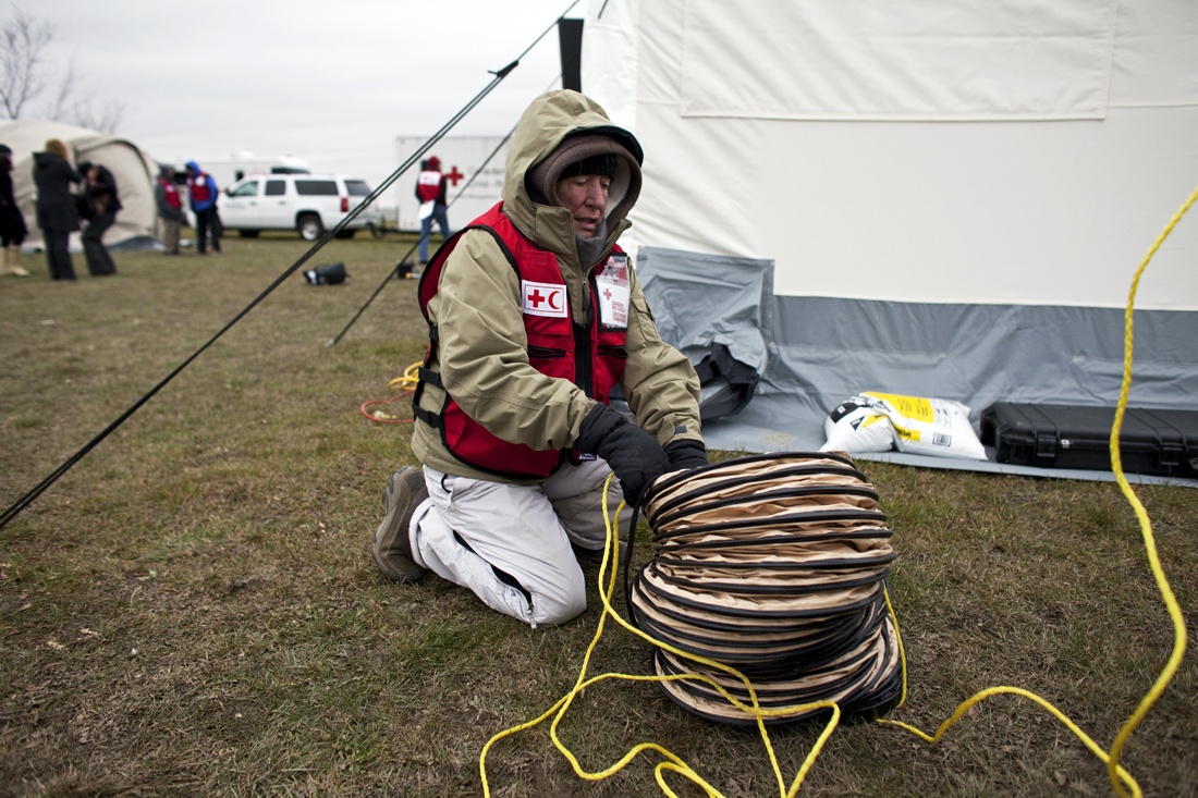 A Red Cross delegate hard at work at the field hospital. / Photo credit: Johan Hallberg-Campbell