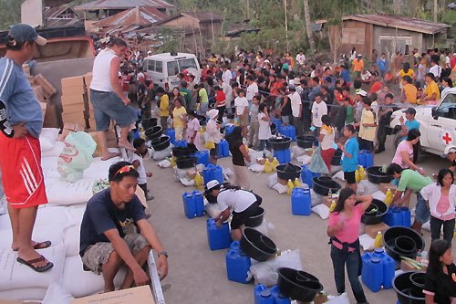 Red Cross delivering aid after Typhoon Bopha