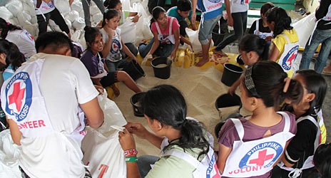 From packing of items to distribution, volunteers play a big role in carrying out relief efforts by Red Cross chapters greatly affected by cyclone Bopha. 