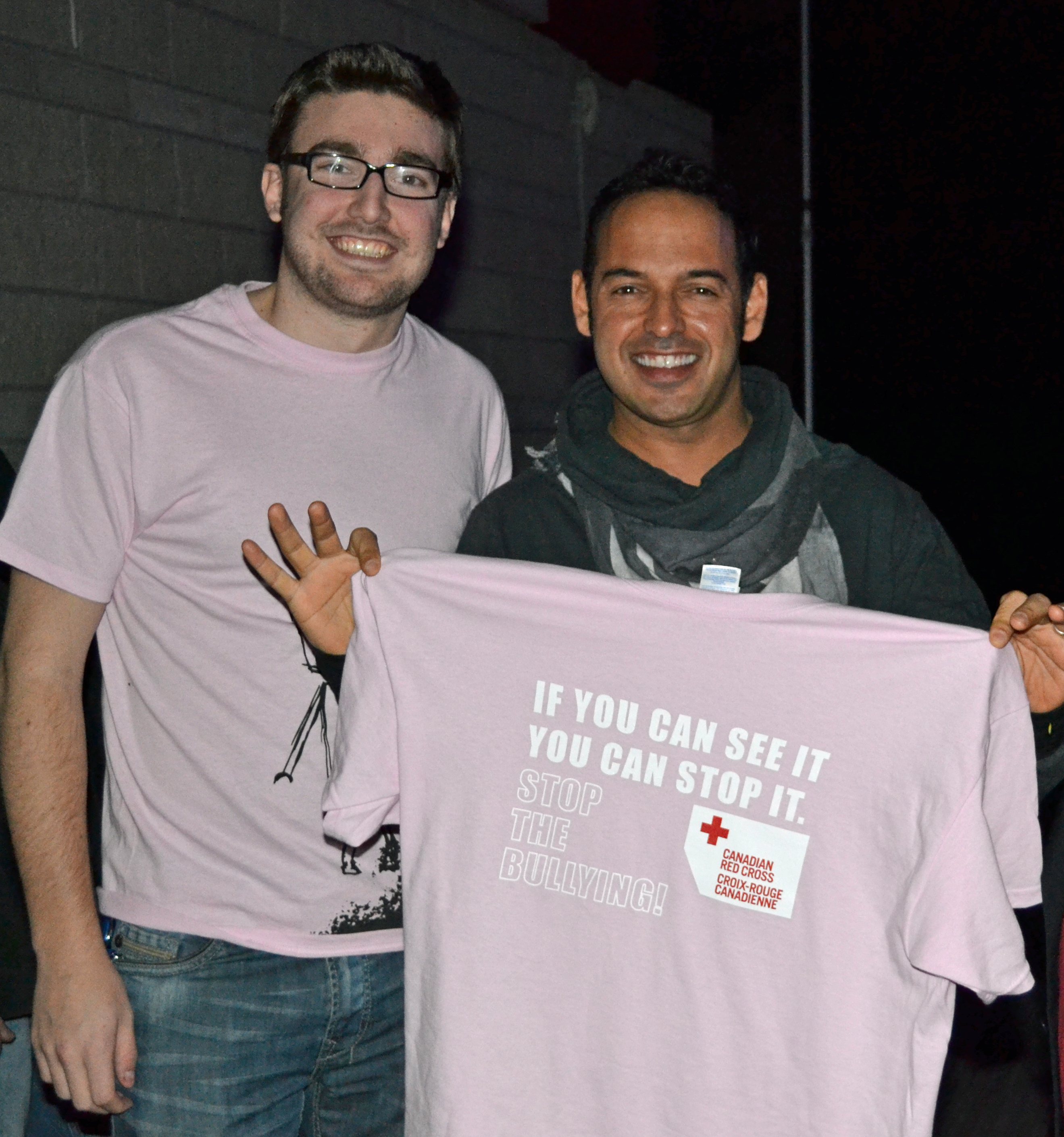 Travis Price, bullying and violence prevention coordinator for the Canadian Red Cross with comic Shaun Majumder.