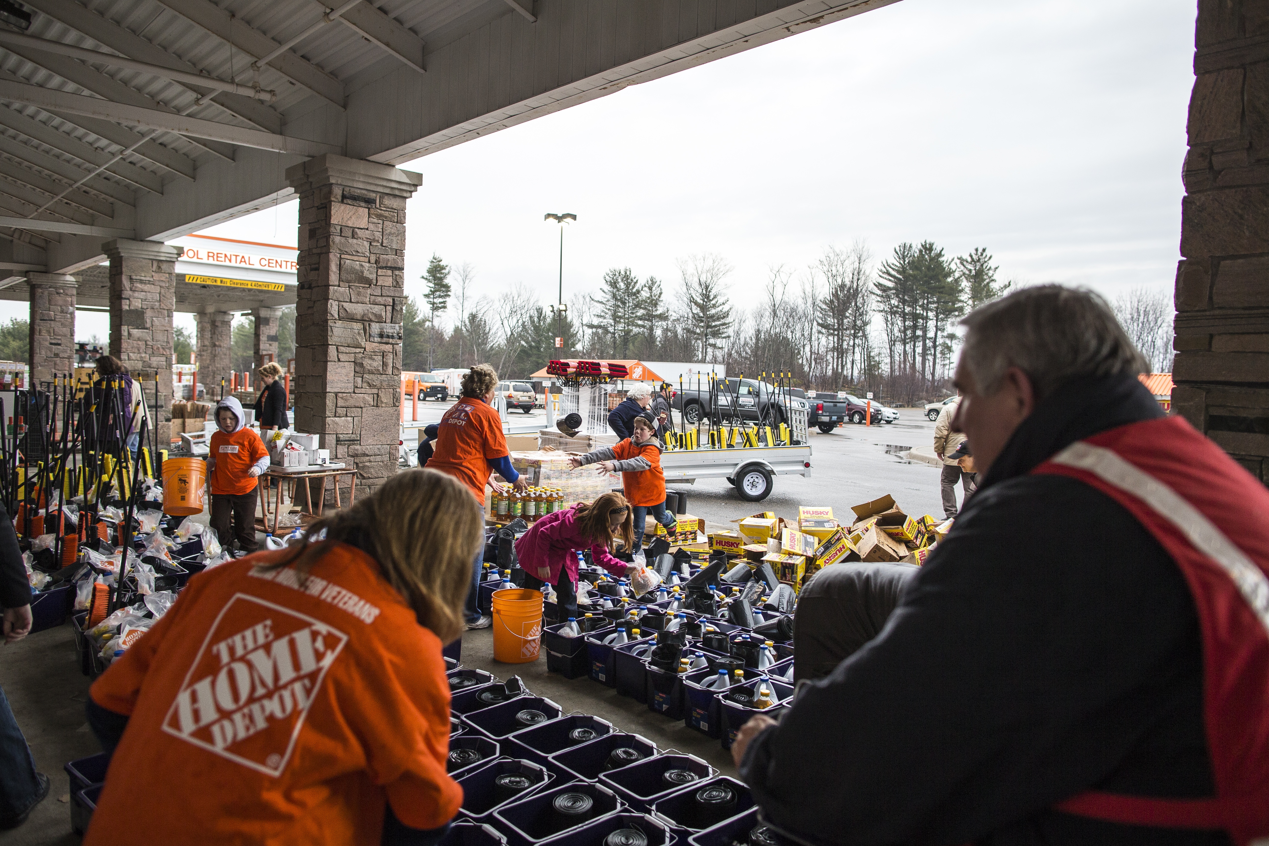 Assembling clean-up kits at The Home Depot in Bracebridge to assist families affected by flooding.