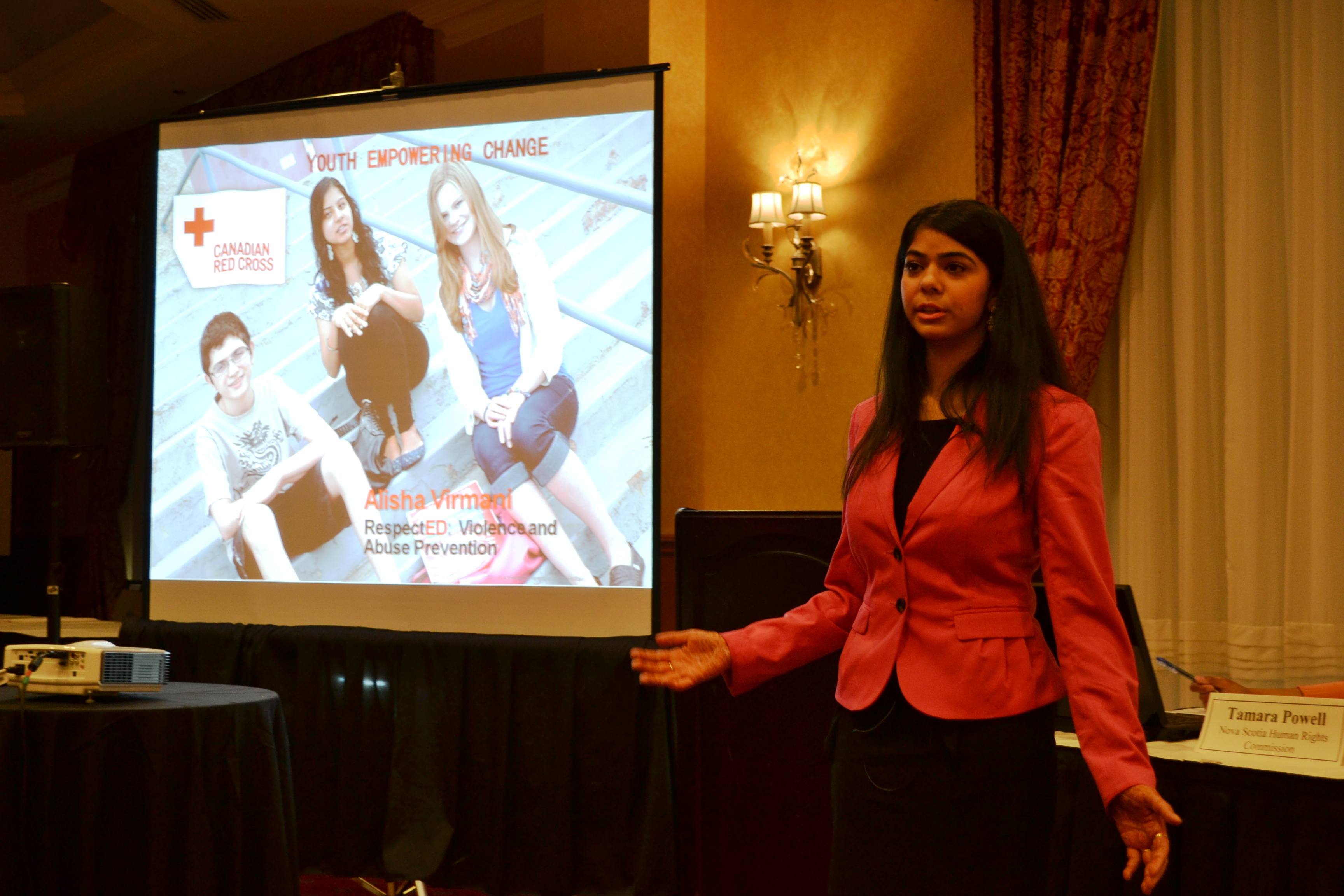 Alisha Virmani speaking about bullying at a recent conference on human rights