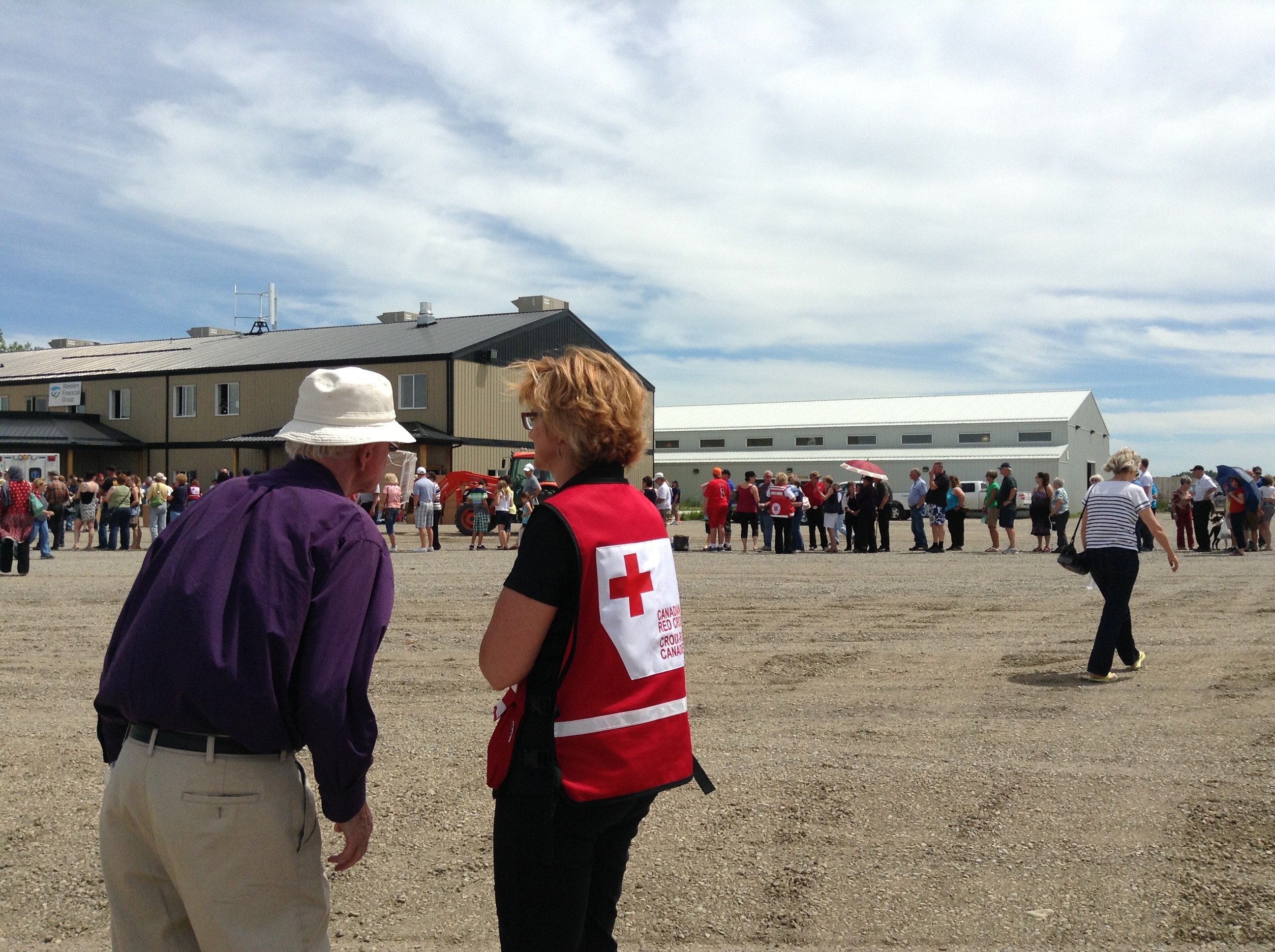Red Cross staff and volunteers providing assistance to residents of High River