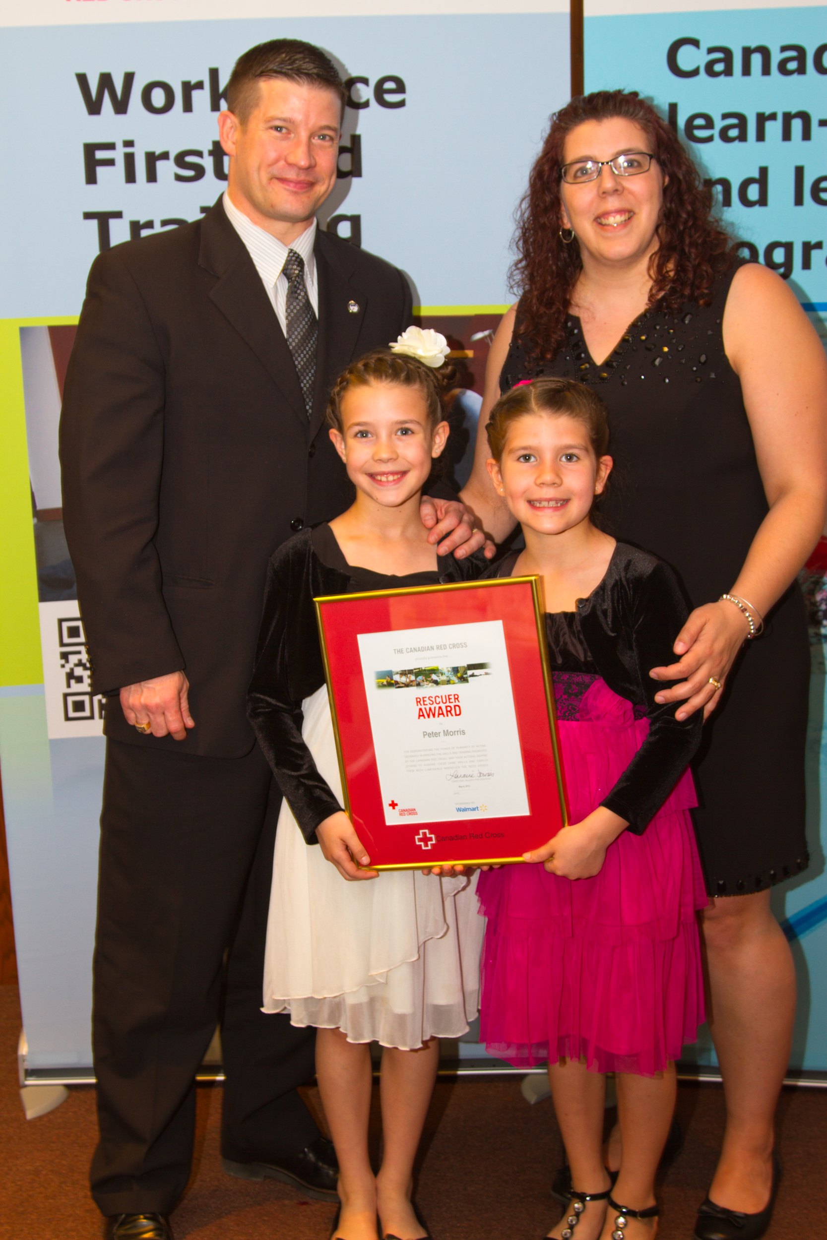Constable Peter Morris and his family. Const. Morris received a Rescue Award from the Red Cross.