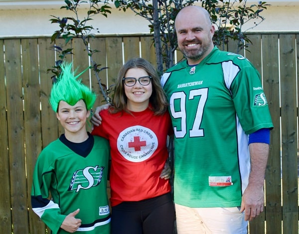 Shaune Beatty and his kids, Eli and Piper, are avid Roughrider fans.