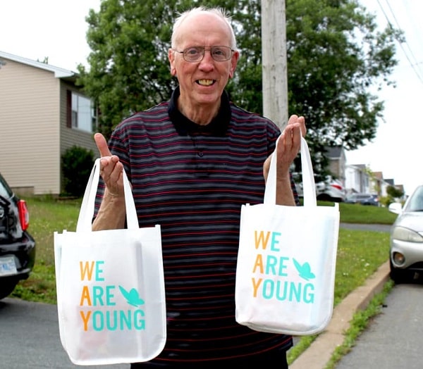 Colin McCrae volunteers at We Are Young, a Nova Scotia-based non-profit that is using funds received from the Red Cross to reach out to more seniors who may be feeling isolated during COVID-19. Here, Colin prepares to deliver a couple of self-care gift bags to seniors in need. The Government of Canada provided the funds through its Emergency Community Support Fund granting program.