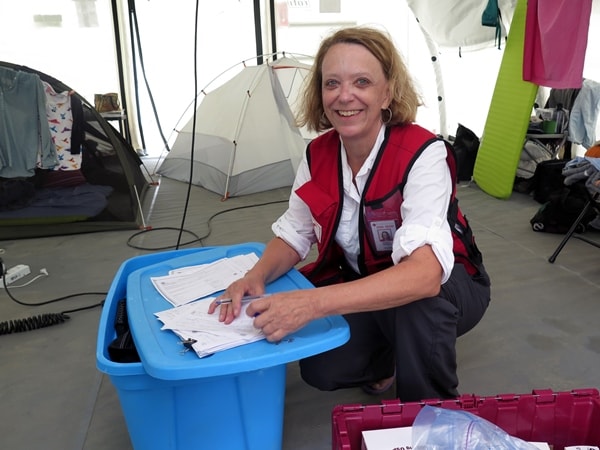 Canadian Red Cross Doctor Patricia Connick getting medication ready to go out on a mobile clinic