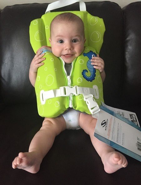 Trying on lifejackets for the first time!