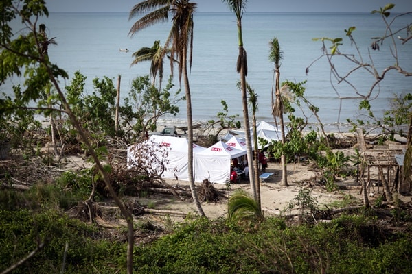 View of mobile clinic setup by the beach in Lahaie, Haiti