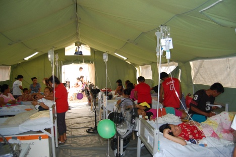 Patients quickly filled the wards at the Red Cross field hospital in Ormoc.