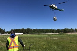 Helicopters delivering refrigerators and freezers