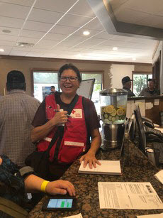 volunteers helping register and assist those affected by the fires