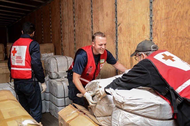Volunteers loading truck in Ontario