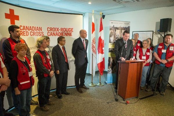 Red Cross aid workers and Minister Paradis