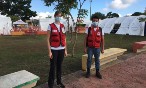 Two Red Cross Volunteers standing beside each other in Honduras