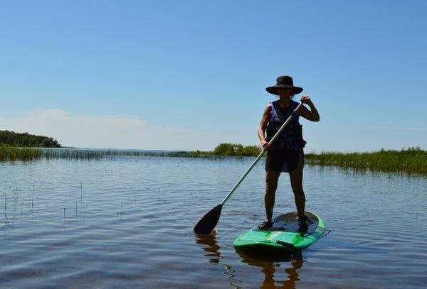 Woman on a stand-up paddle board