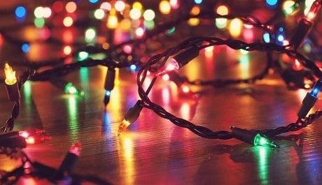 A string of colourful lights lying on the floor