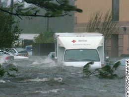 Red Cross truck navigating flooded street during Hurricane Katrina