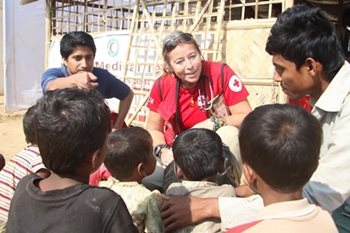 Canadian Red Crosser Patrice Gordon talking to those seeking safety in Bangladesh