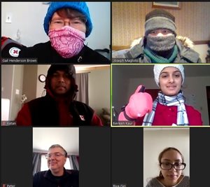 A zoom meeting with newcomers, dressed in winter gear