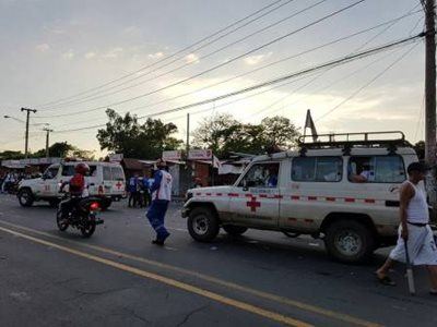Red Cross vehicles on a street