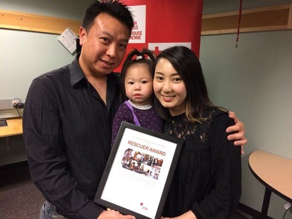 The Canadian Red Cross presented Yanie Choi with a Rescuer Award for saving her choking daughter’s life.