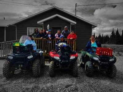 Gathering Place participants with four wheelers