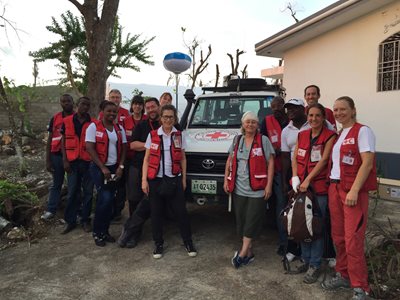 France with a dozen CRC workers in front of a Red Cross Van, in Haiti