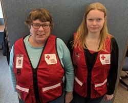 Canadian Red Cross volunteers Carolyn Wanamaker (left) and Tonya Bradley (right) were on site to help Treena after the fire.