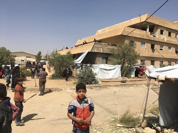 Pamela Riley, Country Representative for the Canadian Red Cross in Syria, visits two camps