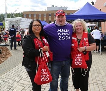 The General Manager of McMurray Metis, Dan Stuckless, at the festival with Red Cross members