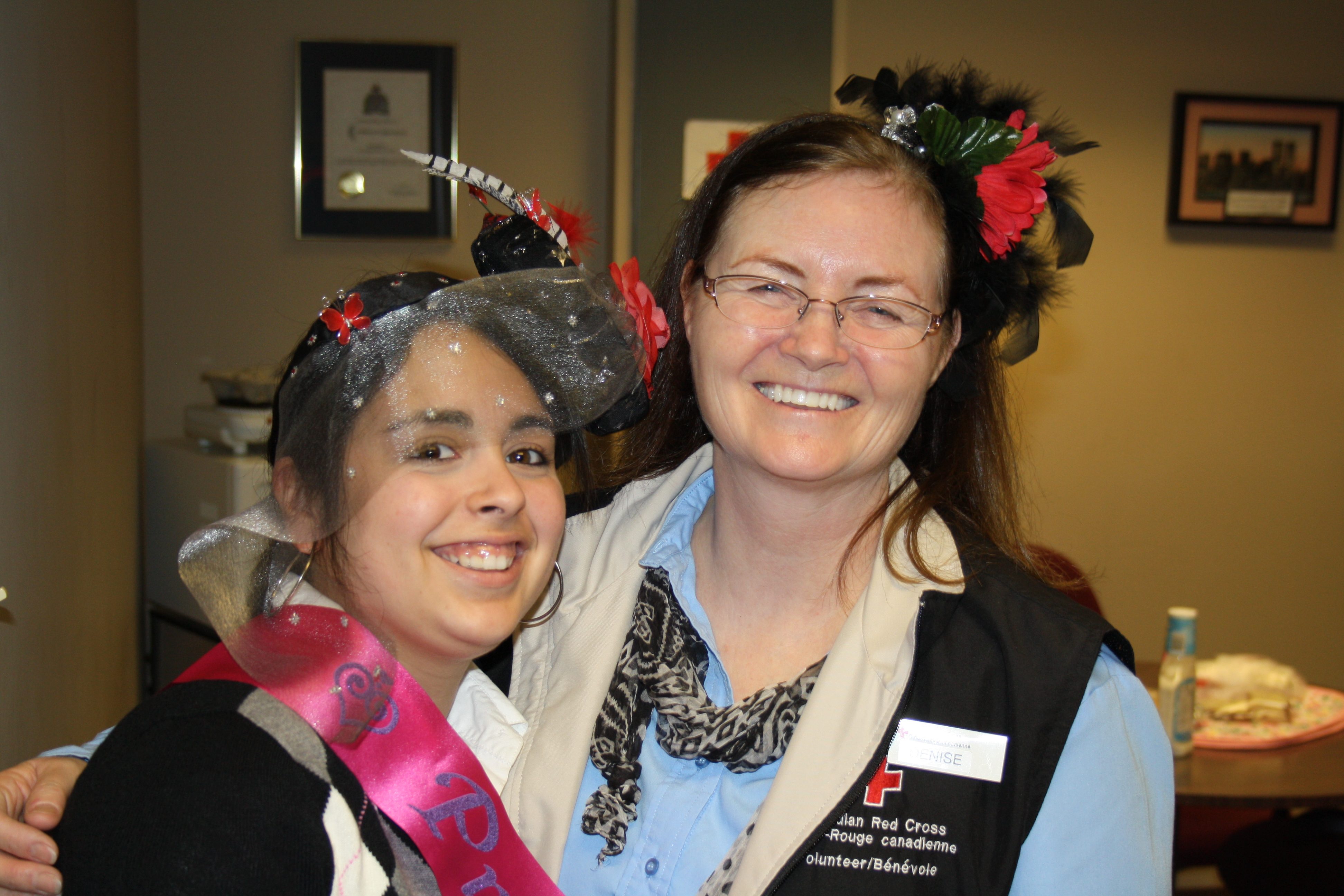 Staff and volunteers celebrate Will and Kate's visit in Canada with royal hat day!