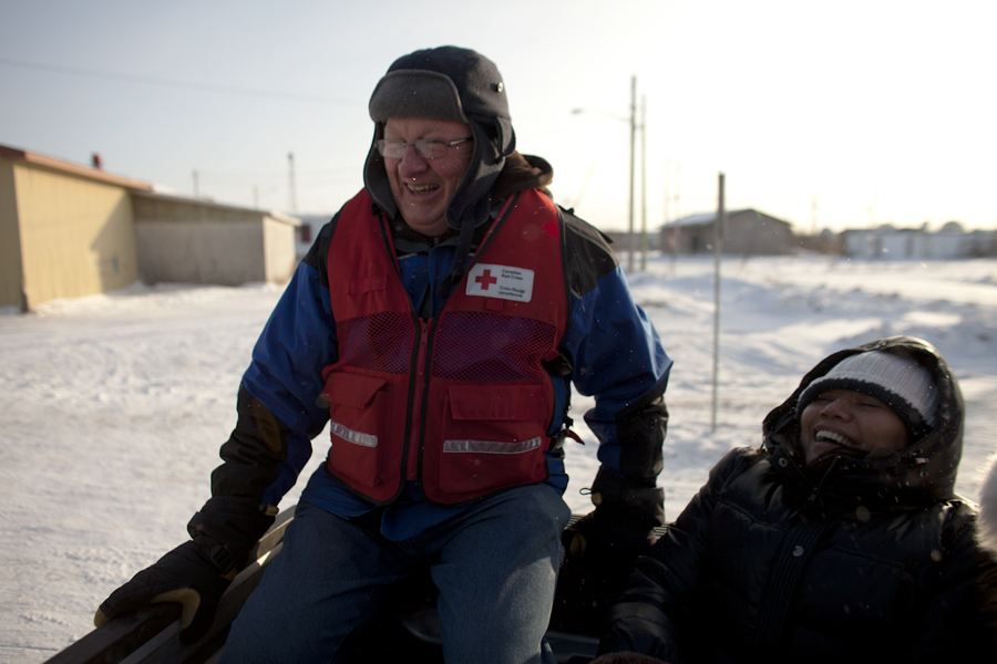 Red Cross volunteer Jim Lanthier in the back of a pick-up during the community Santa Claus parade on Saturday