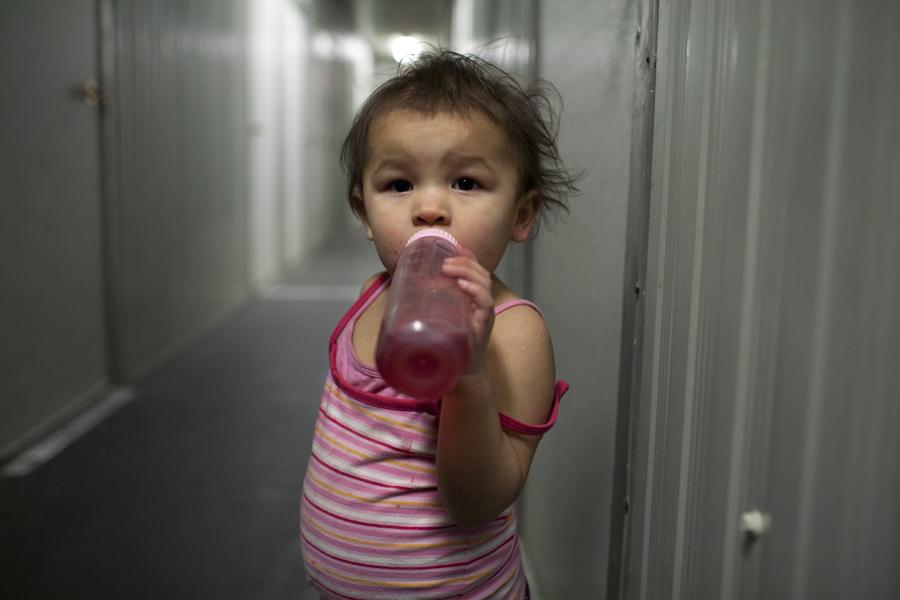 A young girl who lives in a trailer in Attawapiskat