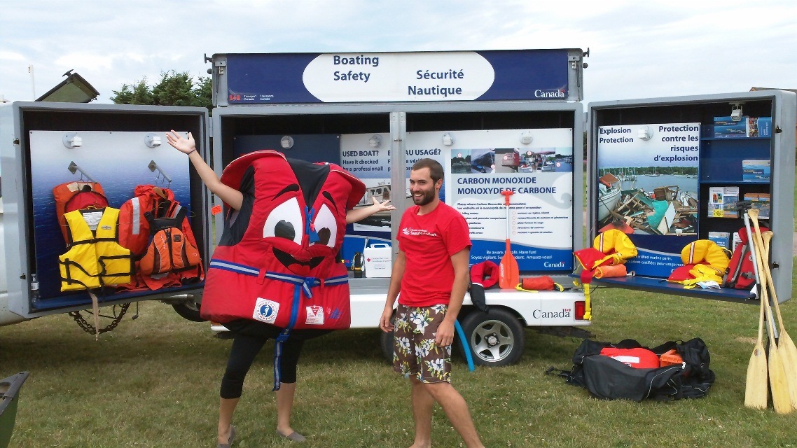 Buckles and Chad demonstrate boating safety