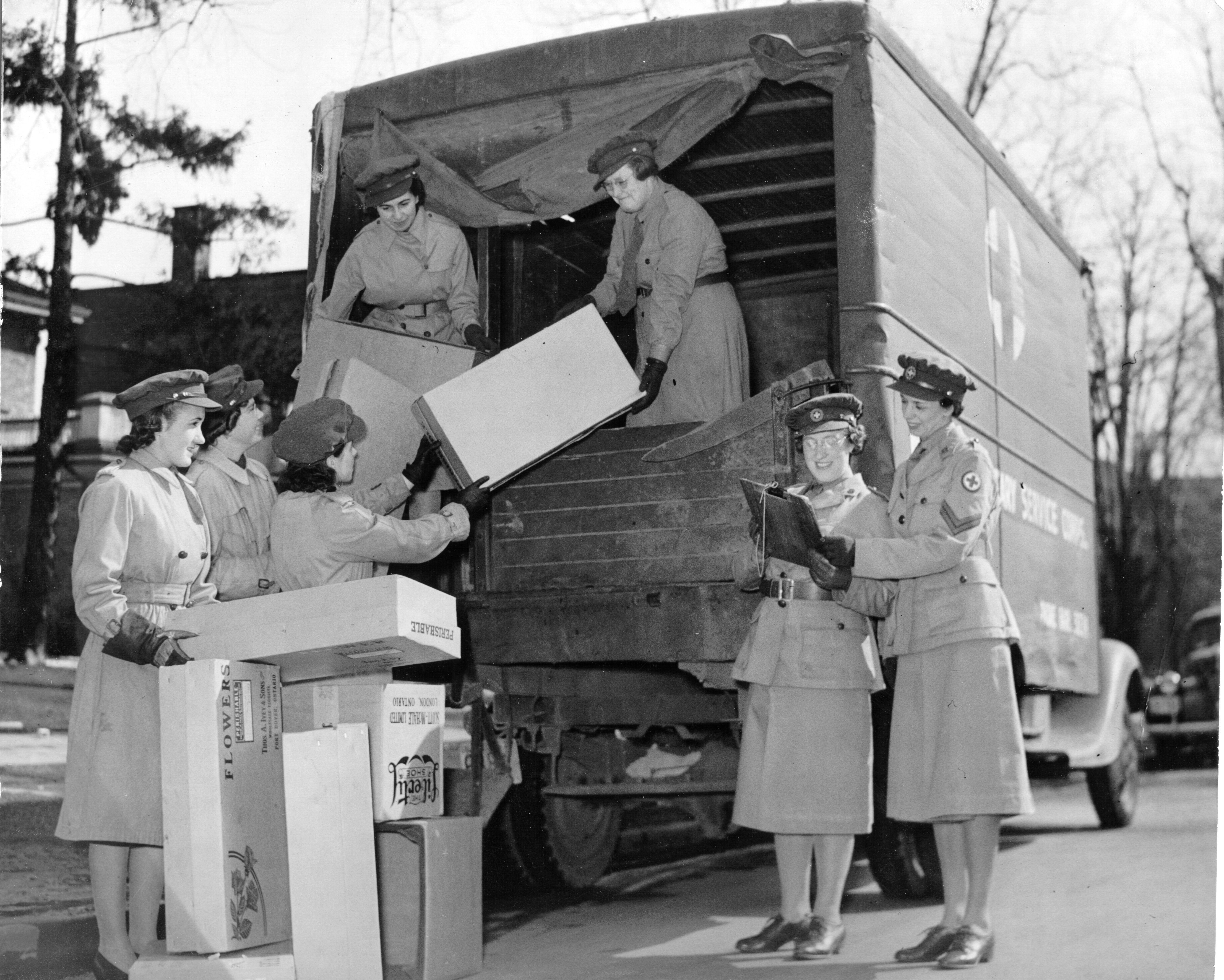 Members of Red Cross Corps Loading Truck