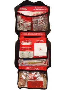 A Deluxe First Aid kit open to display its contents