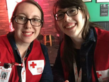 Volunteers Deanna and Jillian, two young women in glasses