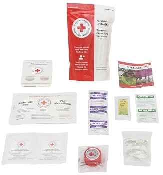 A personal first aid kit open with supplies displayed