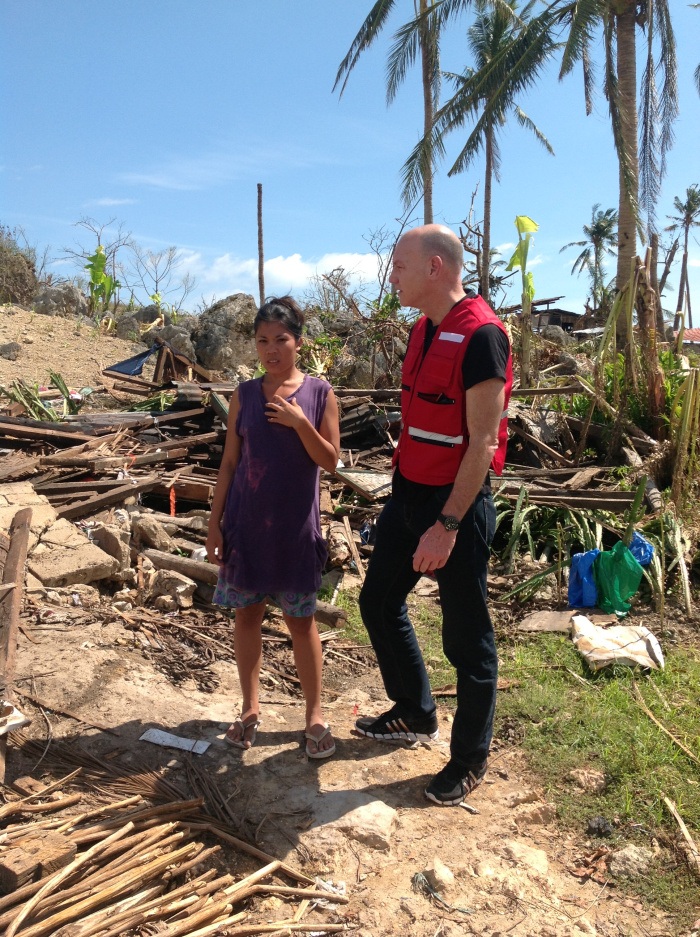 Conrad Sauvé visits a village damaged by Typhoon Haiyan