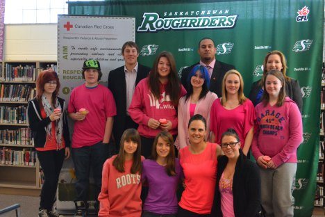 Chris Getzlaf, Luc Mullinder and Regina students at Red Cross and Saskatchewan Roughrider partnership announcement earlier this year.