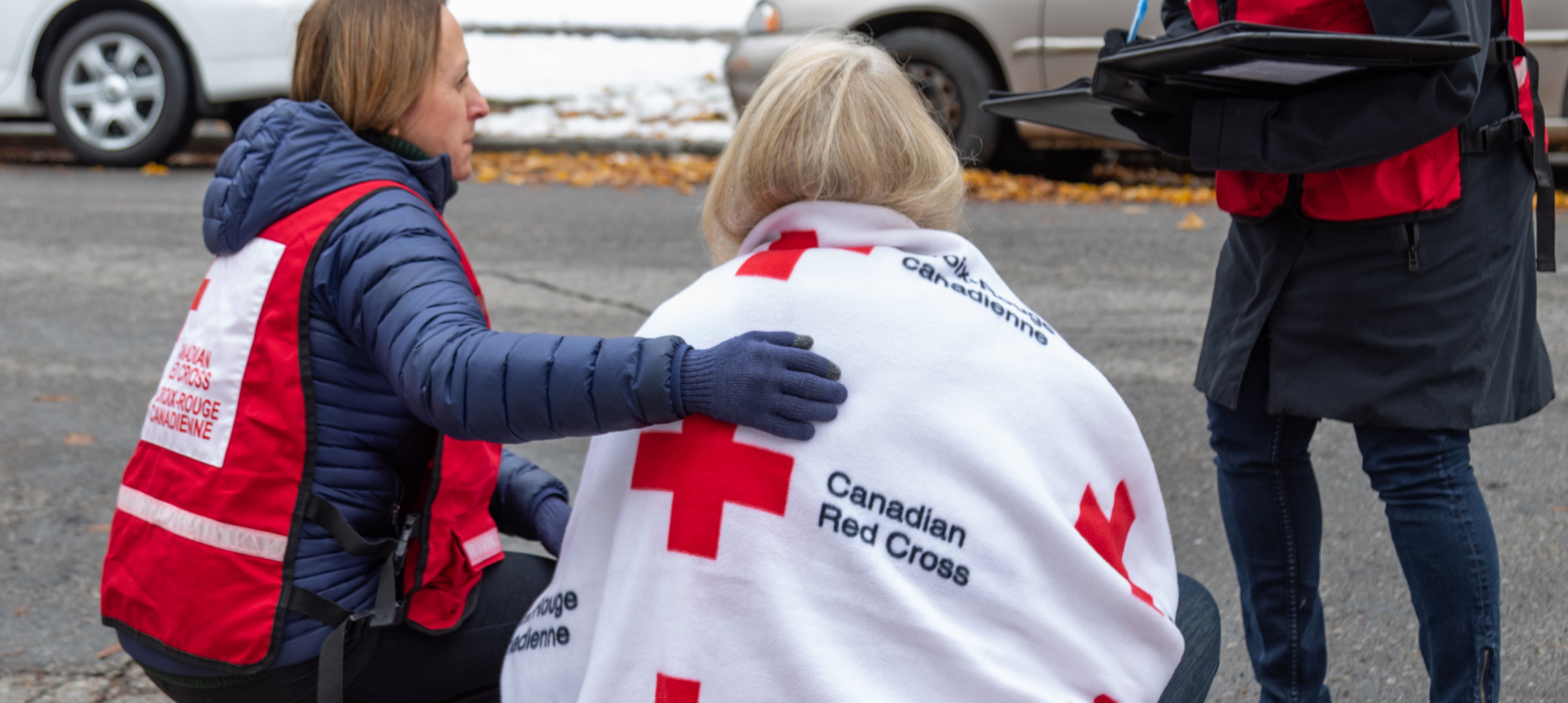 Recipients of Red Cross and Red Crescent aid smiling