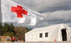 red cross flag and tent