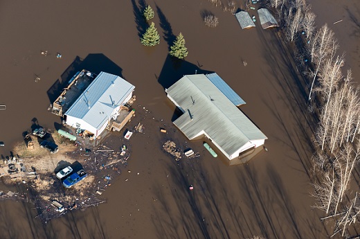 An aerial shot capturing the flooding on rural farmland.