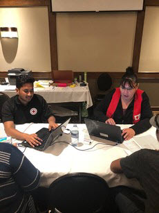 volunteers helping register and assist those affected by the fires