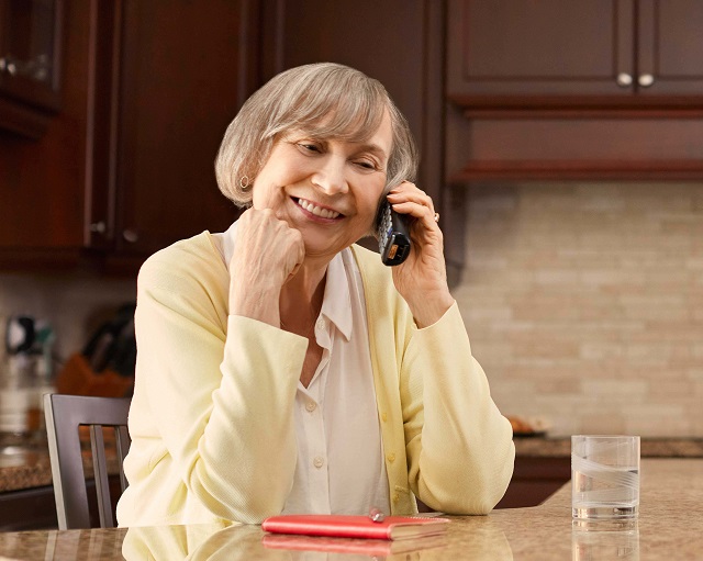 elderly lady talking on the phone