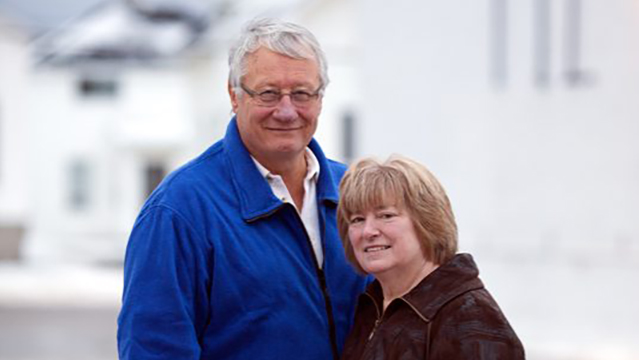 Rob and Joy Galloway smile for a photo in Timmins, Ontario.