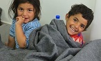 Children with blankets