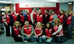 A group of Canadian Red Cross employees posing for a photo during an event
